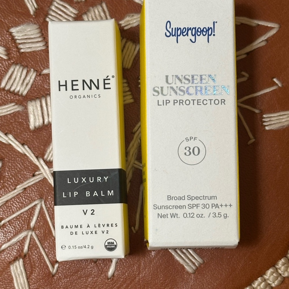 NIB Supergoop and Henné lip balm